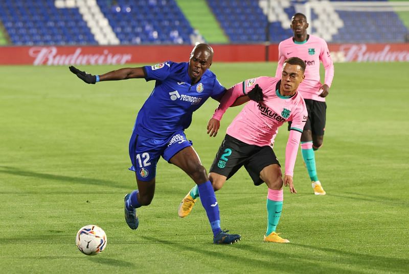 Allan Nyom in action for Getafe against Barcelona